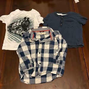 Three baby boy shirts.
